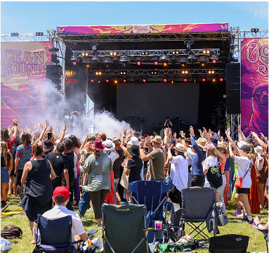 Crowd in front of stage with smoke machine